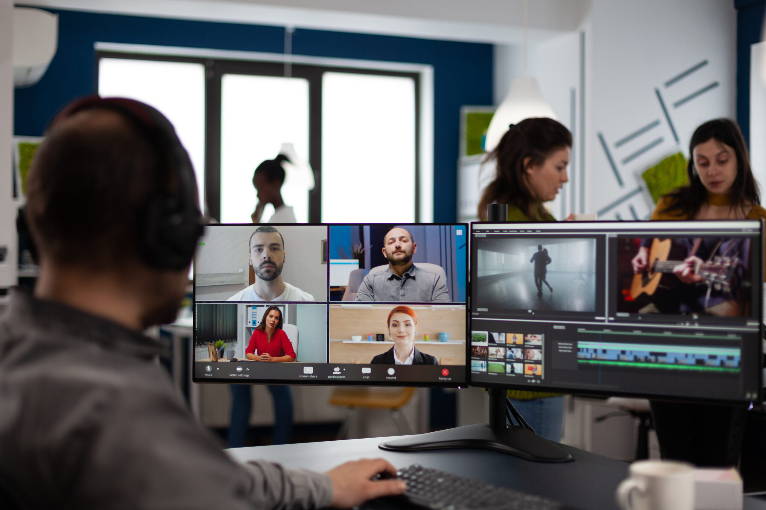 Senior video editor director talking with creative team in web online meeting